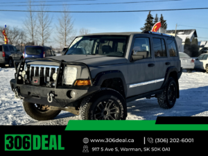 A 7 passenger 2007 Jeep Commander with a rugged rocker guard exterior at 306 Deal, car dealer in Warman.